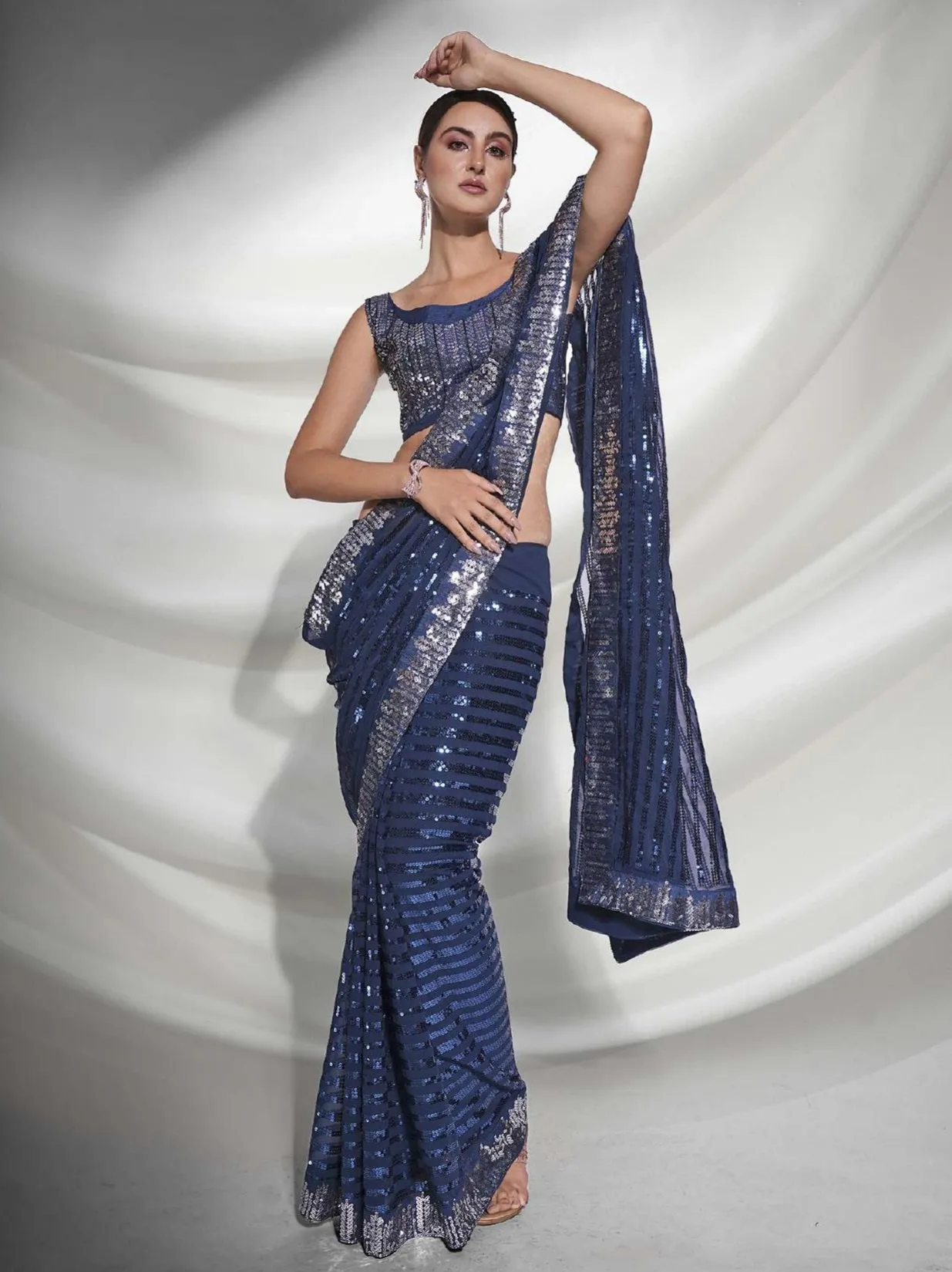 Women Party Wear Designer Sequence Worked Teal Colour Georgette Saree Collection